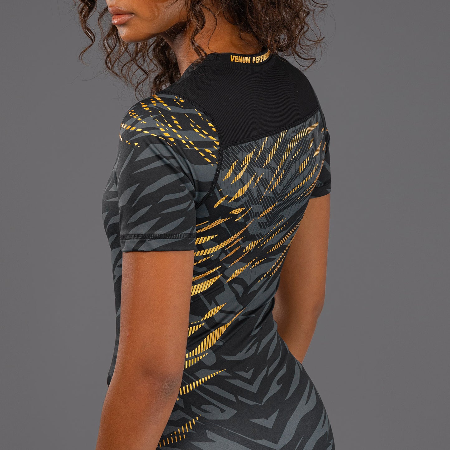 UFC Fusion by Venum Authentic Fight Night Women’s Performance Short Sleeve Rashguard - Champion