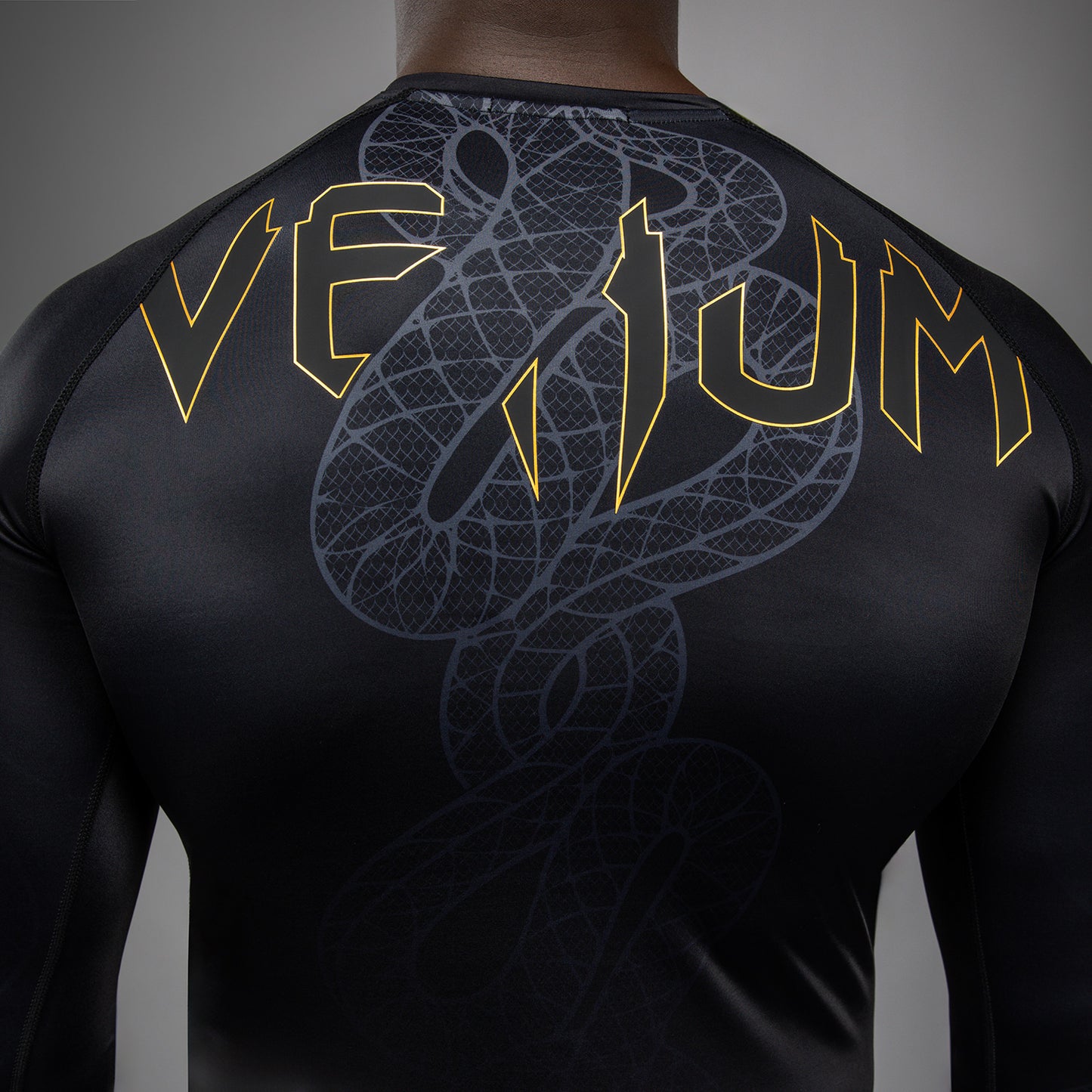 Venum Serpenti Long Sleeve Rashguard - Black/Silver/Gold