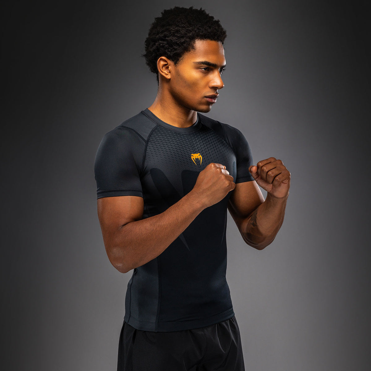 Venum Attack Short Sleeve Rashguard - Black/Gold