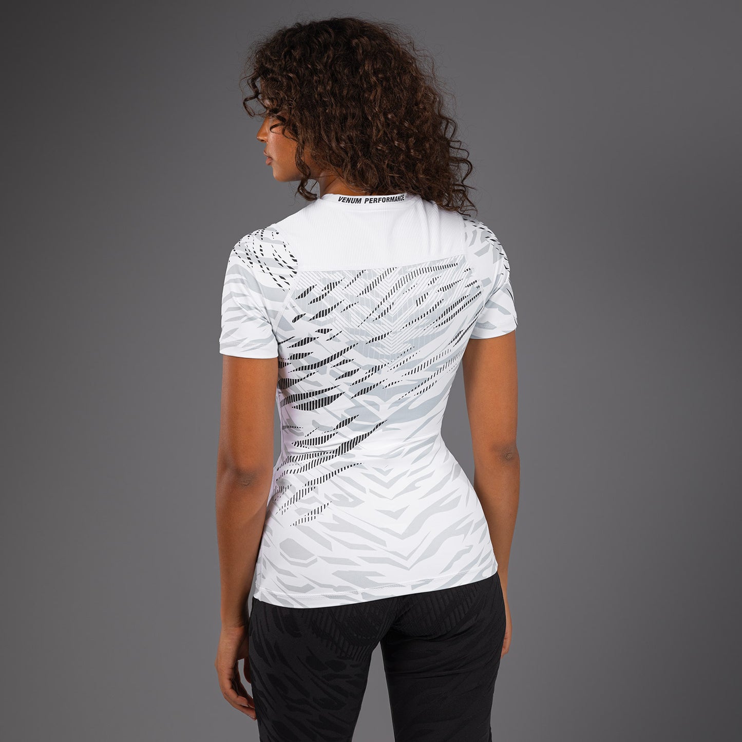 UFC Fusion by Venum Authentic Fight Night Women’s Performance Short Sleeve Rashguard - White