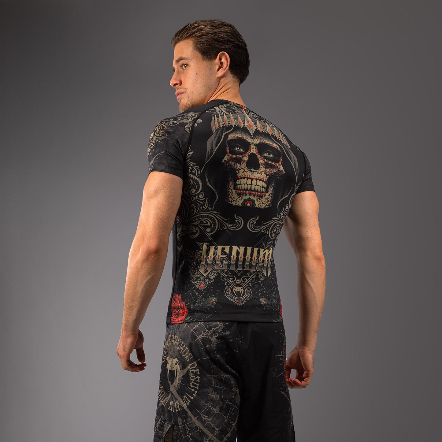 Venum Santa Muerte 5.0 Men’s Short Sleeve Rashguard - Deep Black/Gold