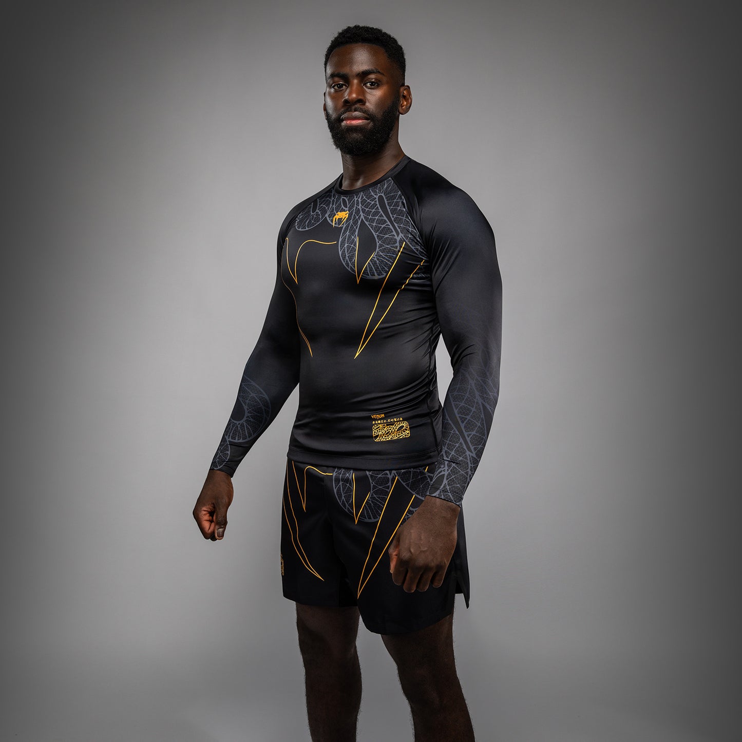 Venum Serpenti Long Sleeve Rashguard - Black/Silver/Gold