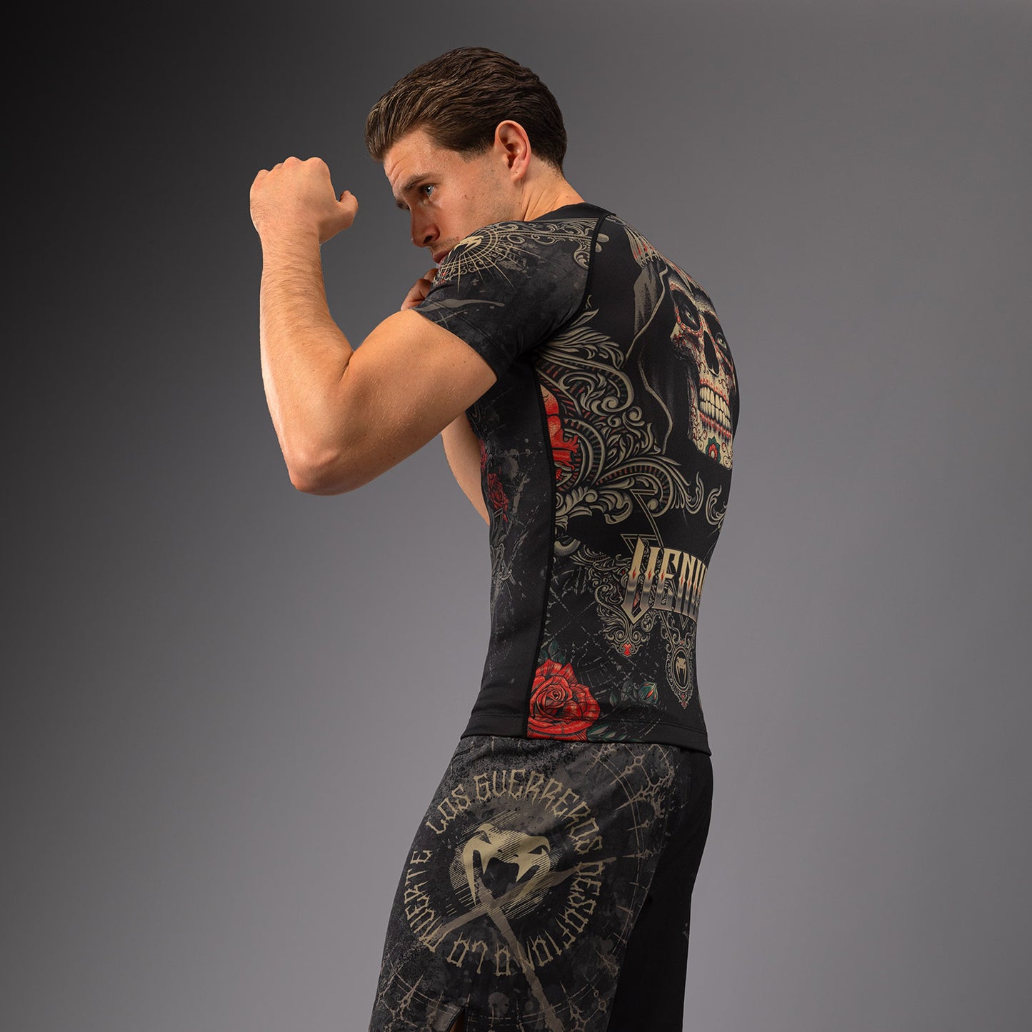 Venum Santa Muerte 5.0 Men’s Short Sleeve Rashguard - Deep Black/Gold