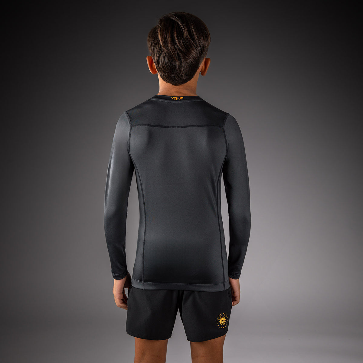 Venum Attack Long Sleeve Rashguard for Kids - Black/Gold