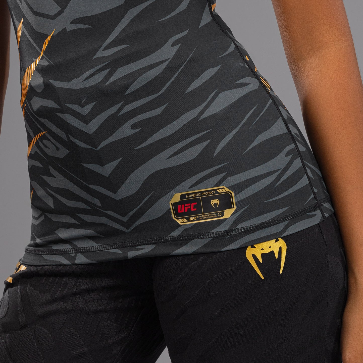 UFC Fusion by Venum Authentic Fight Night Women’s Performance Short Sleeve Rashguard - Champion