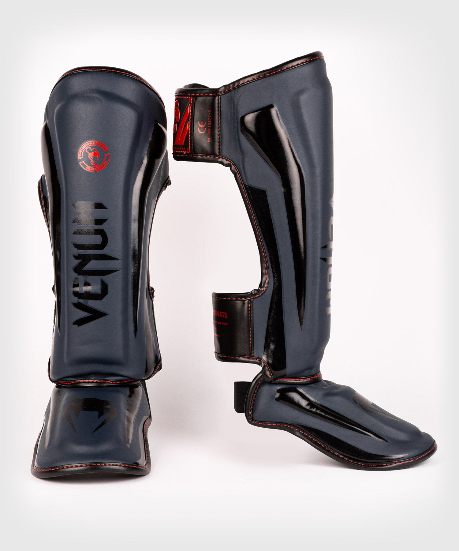 Venum Elite Evo beenbeschermer - kaki/zilver - M Venum Elite Evo beenbeschermer - kaki/zilver - M